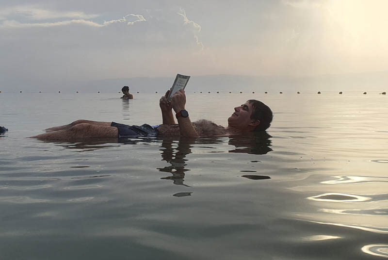 Floating in the waters of the Dead Sea
